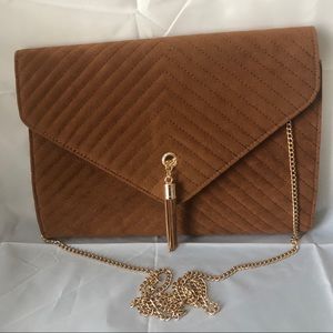 Brown and gold clutch